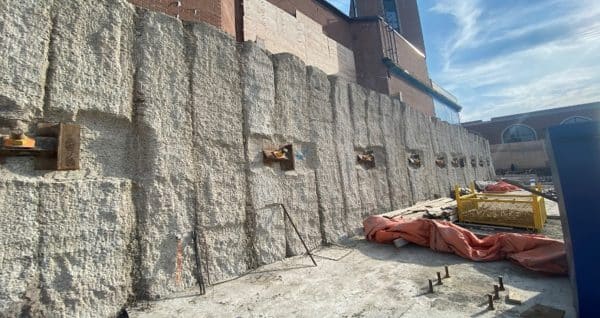 Temporary shoring wall with soil nails at 935 Eglinton Avenue West construction site.